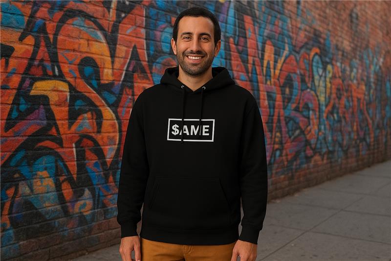 Man wearing black hoodie with $AME text design